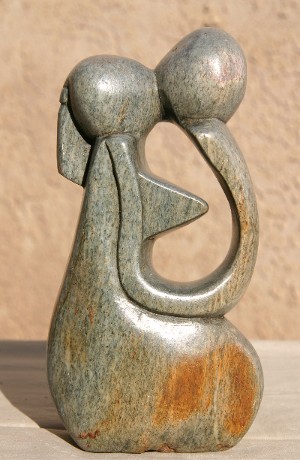 Green and Rust Coloured Kissing Couple